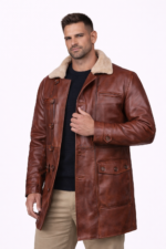 button front closure detail on mens brown shearling lined leather coat